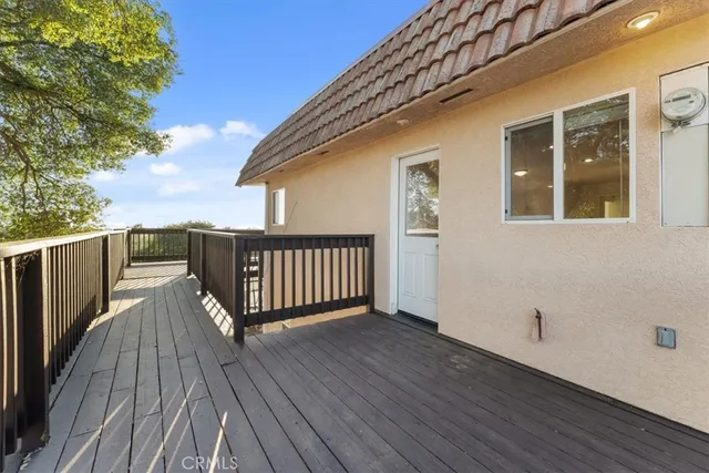 a view of a yard with large trees