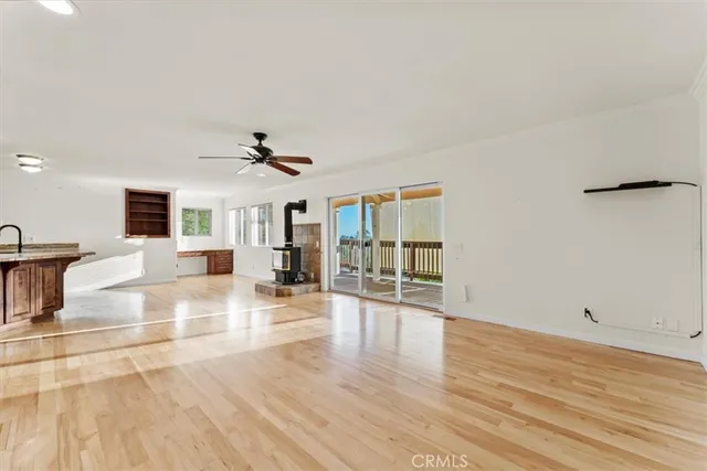a view of a bedroom with a balcony