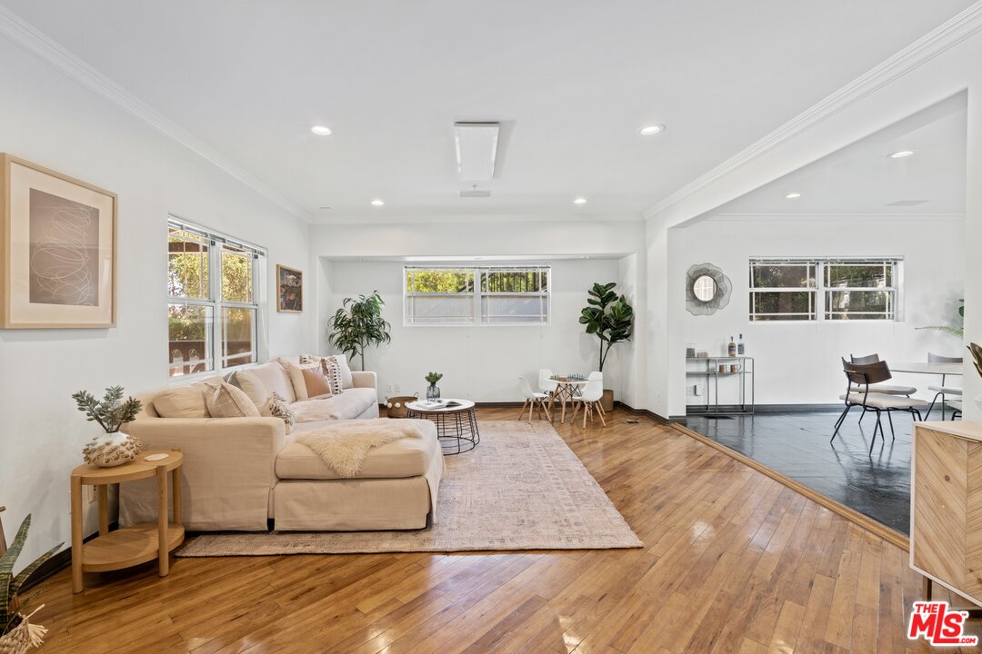 285 Barthe Drive Pasadena, CA 91103 - Photo 11 of 53 a living room with furniture and wooden floor
