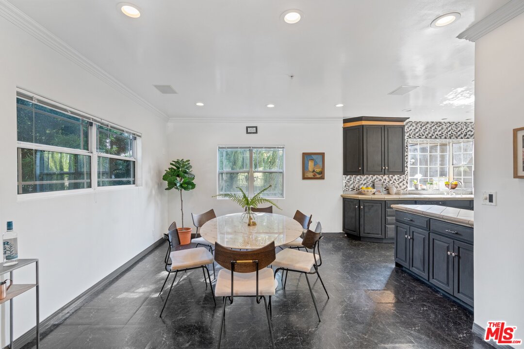 285 Barthe Drive Pasadena, CA 91103 - Photo 12 of 53 a view of a dining room with furniture and window