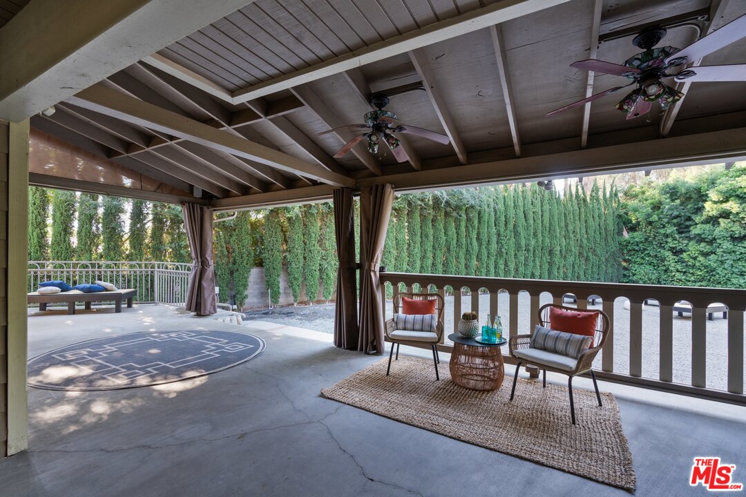 285 Barthe Drive Pasadena, CA 91103 - Photo 18 of 53 a view of a porch with furniture and a backyard