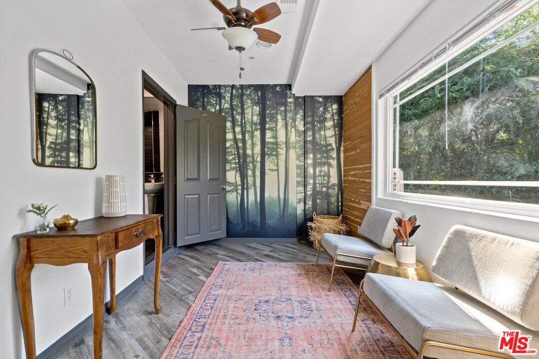 285 Barthe Drive Pasadena, CA 91103 - Photo 25 of 53 a living room with furniture and a window