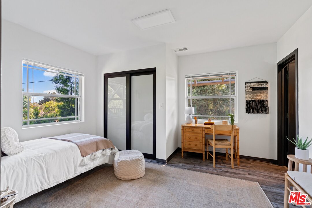 285 Barthe Drive Pasadena, CA 91103 - Photo 34 of 53 a bed room with a bed and a window