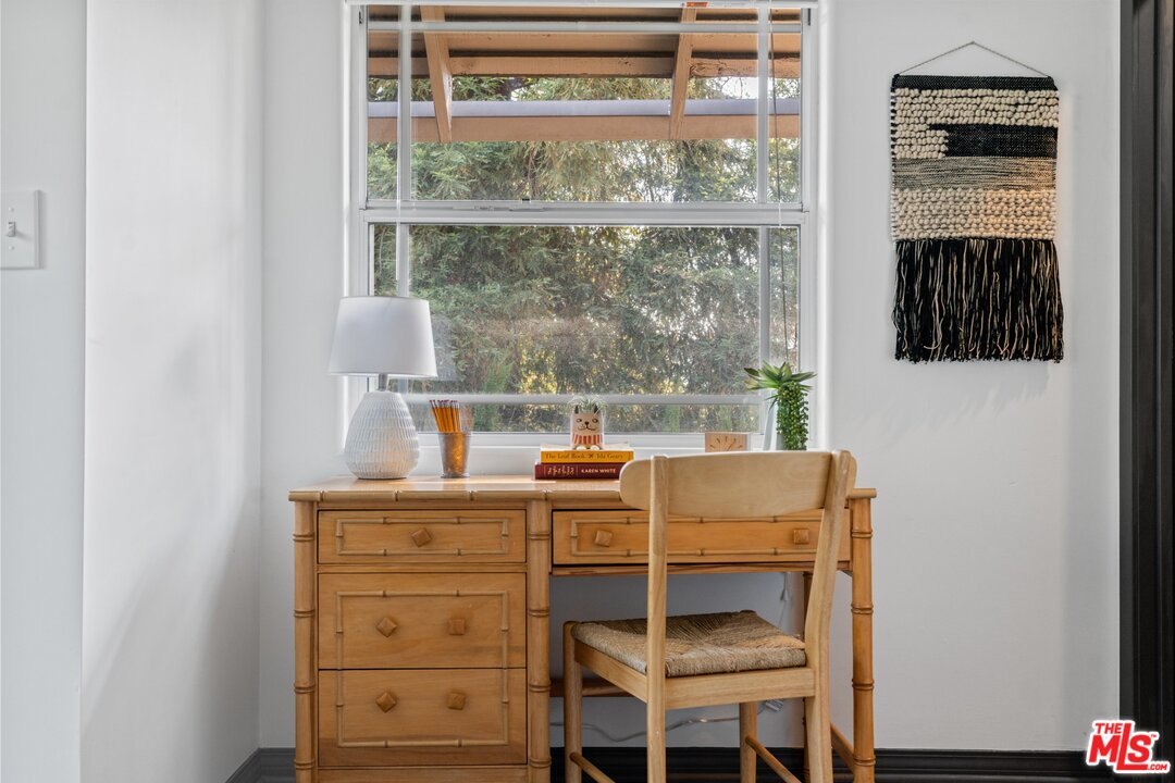 285 Barthe Drive Pasadena, CA 91103 - Photo 35 of 53 a view of a room that has a bed and a window in it