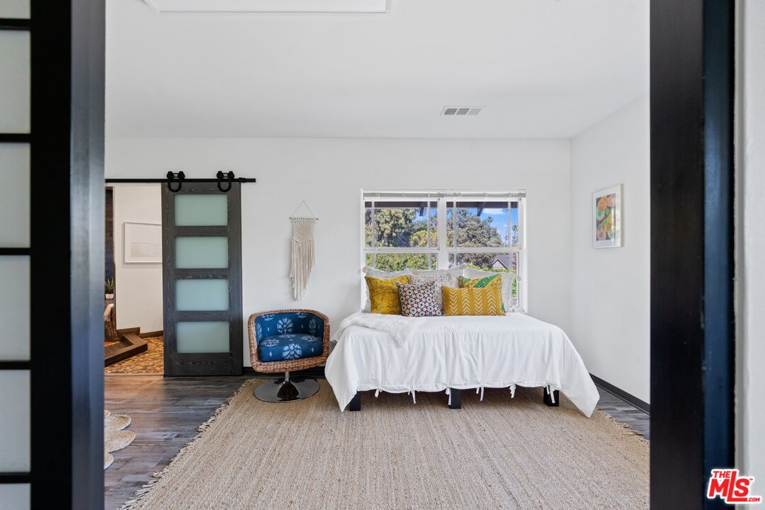 285 Barthe Drive Pasadena, CA 91103 - Photo 39 of 53 a bedroom with a bed and a window