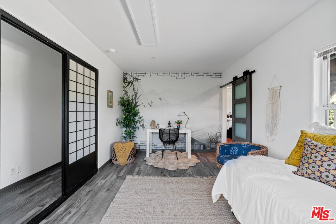 285 Barthe Drive Pasadena, CA 91103 - Photo 41 of 53 a bedroom with furniture and wooden floor