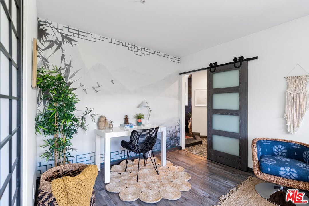 285 Barthe Drive Pasadena, CA 91103 - Photo 42 of 53 a workspace with furniture and a potted plant