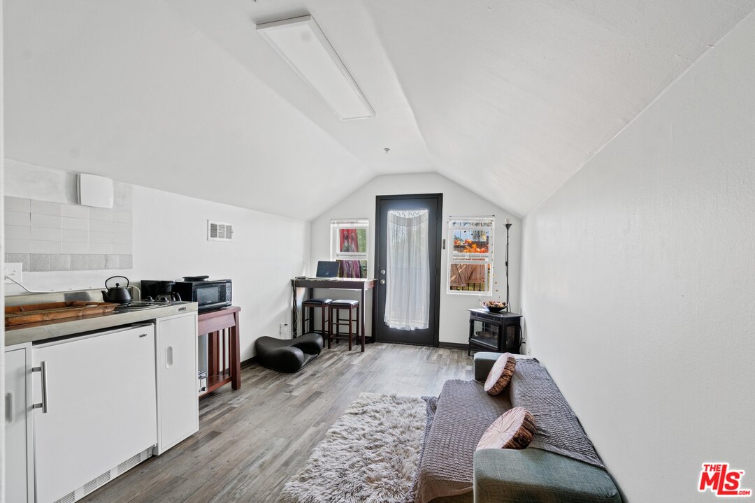 285 Barthe Drive Pasadena, CA 91103 - Photo 46 of 53 a view of a workspace with furniture and wooden floor