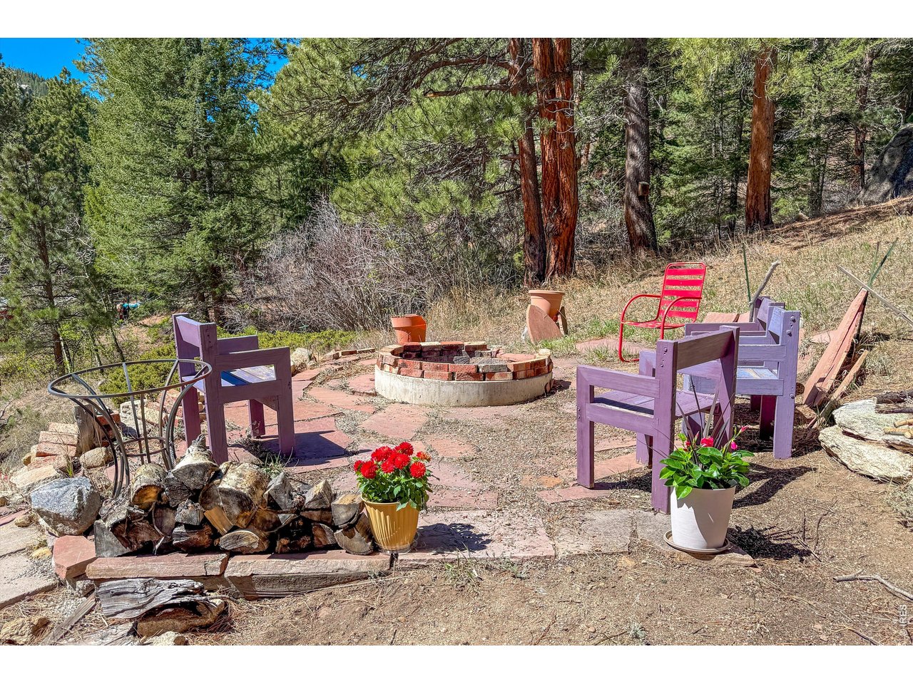 2508 Riverside Drive Lyons, CO 80540 - Photo 38 of 50 an outdoor space with seating