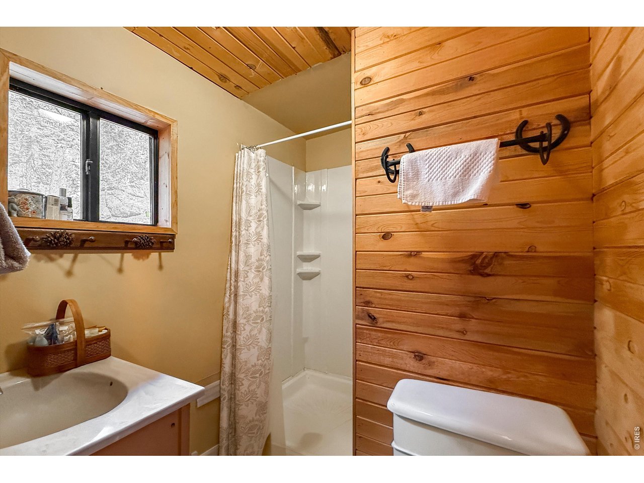 2508 Riverside Drive Lyons, CO 80540 - Photo 44 of 50 a bathroom with a sink and a mirror