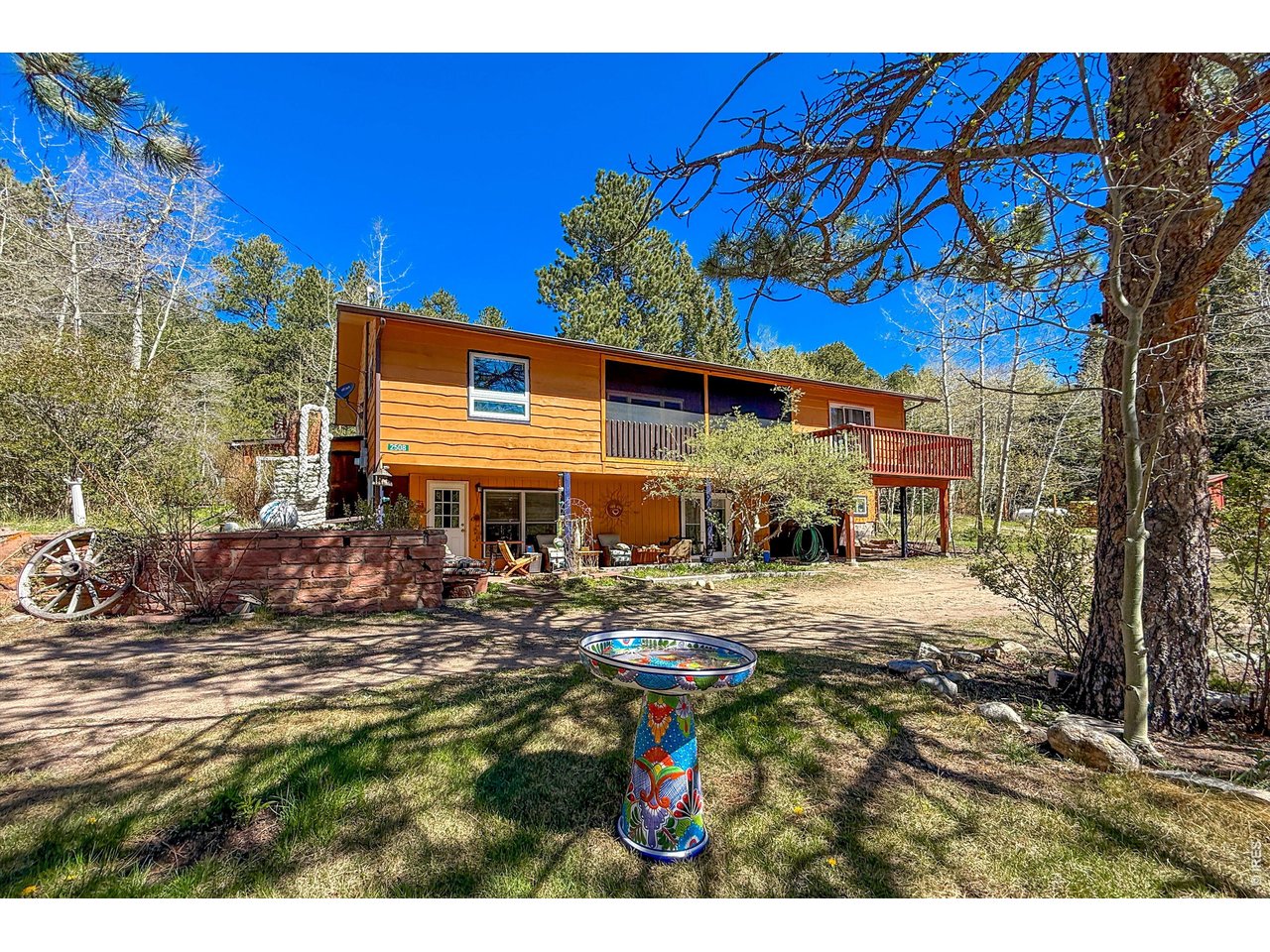 2508 Riverside Drive Lyons, CO 80540 - Photo 6 of 50 a view of a house with a patio