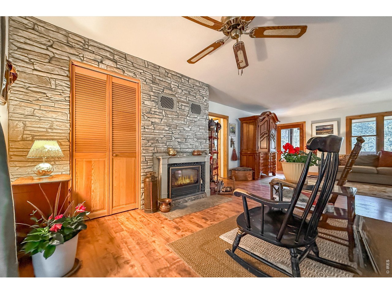 2508 Riverside Drive Lyons, CO 80540 - Photo 10 of 50 a view of a livingroom with furniture and a fireplace