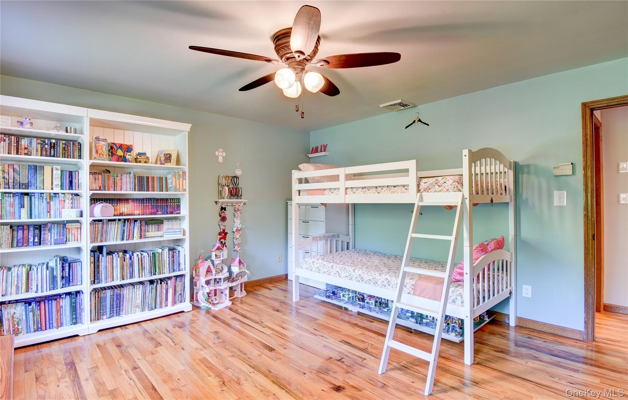 29 Valley View Road Bloomingburg, NY 12721 - Photo 21 of 50 a bedroom with bunk bed and a bookshelf