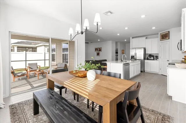 a spacious bedroom with a bed and a window