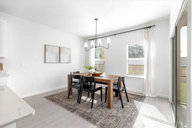 a en suite bathroom with a double vanity sink and mirror