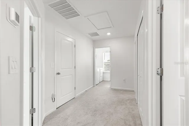 a bathroom with a toilet and a bathtub