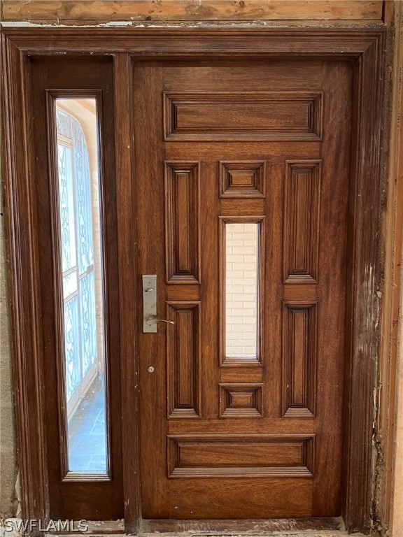 1399 Albatross Road Sanibel, FL 33957 - Photo 6 of 13 a view of a entryway door of the house