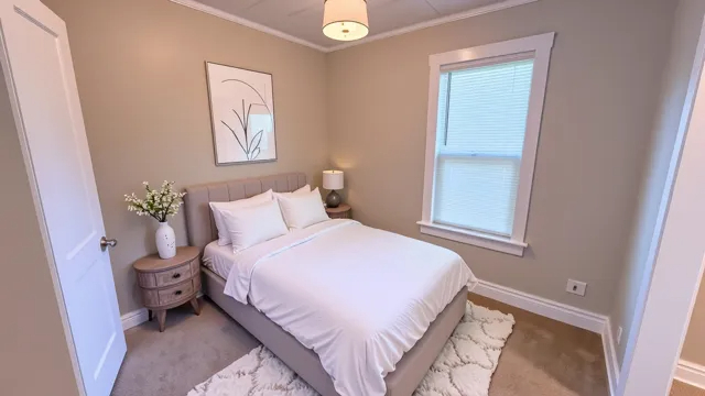 2030 170th Street Hazel Crest, IL 60429 - Photo 12 of 24 a bedroom with a bed and a painting on the wall