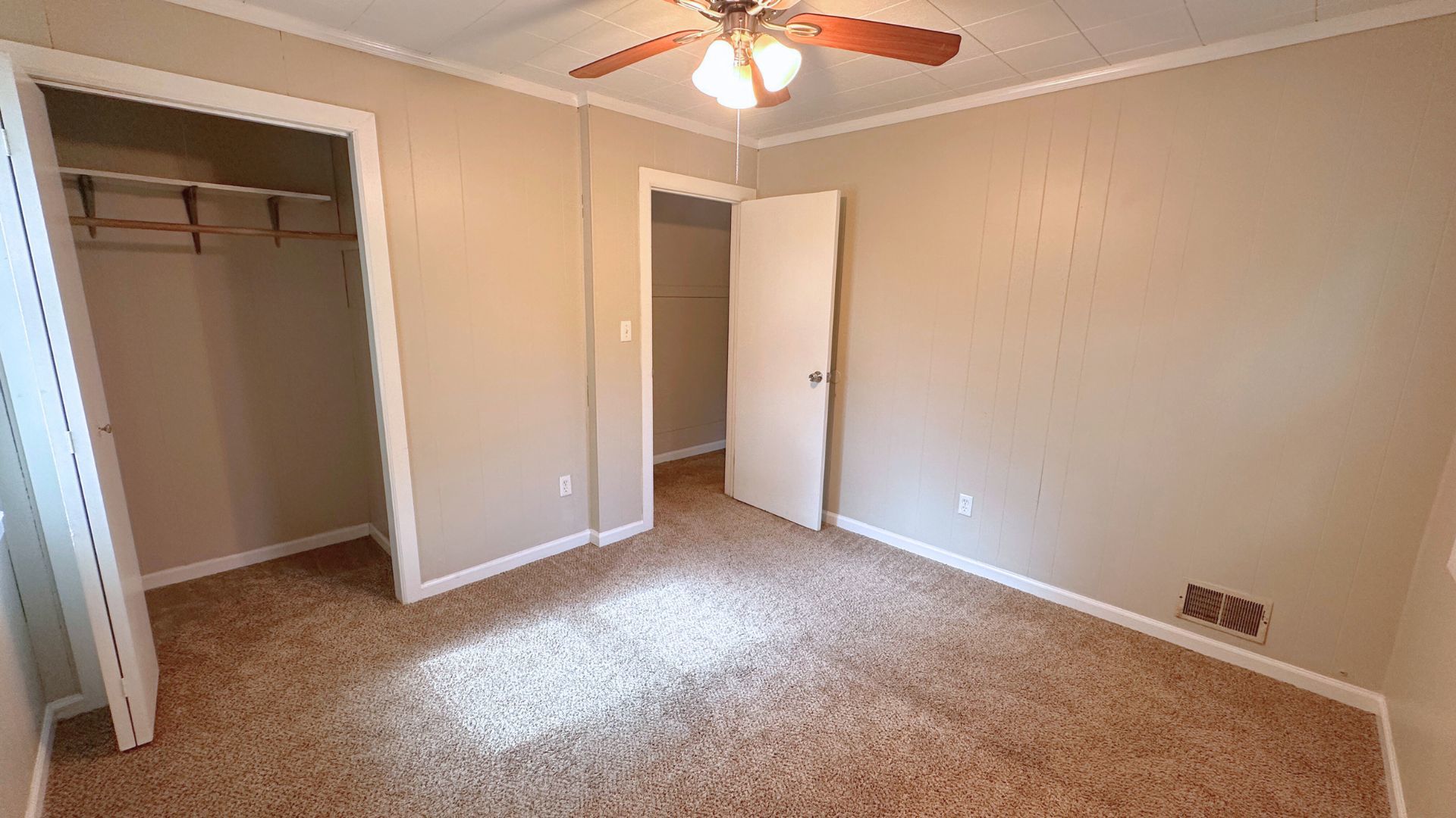 2030 170th Street Hazel Crest, IL 60429 - Photo 17 of 24 an empty room with a chandelier fan and closet