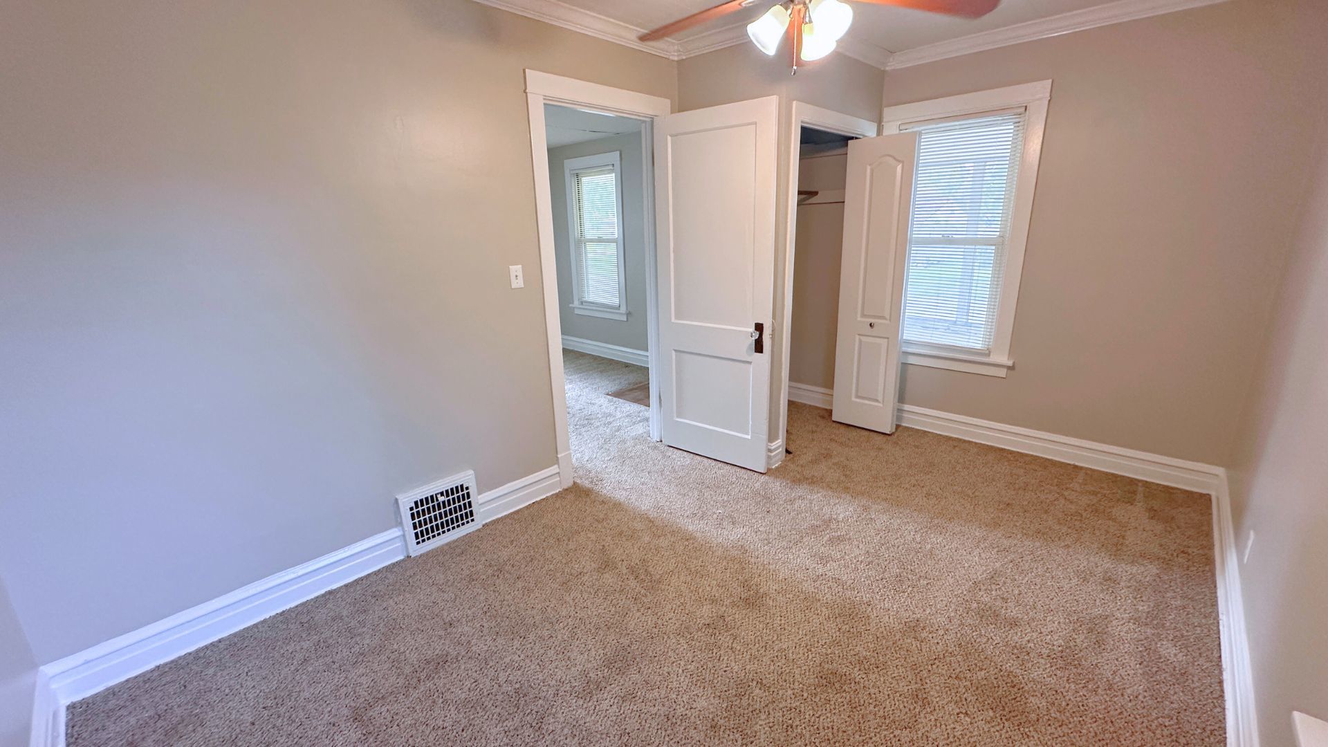 2030 170th Street Hazel Crest, IL 60429 - Photo 8 of 24 an empty room with fan and entrance