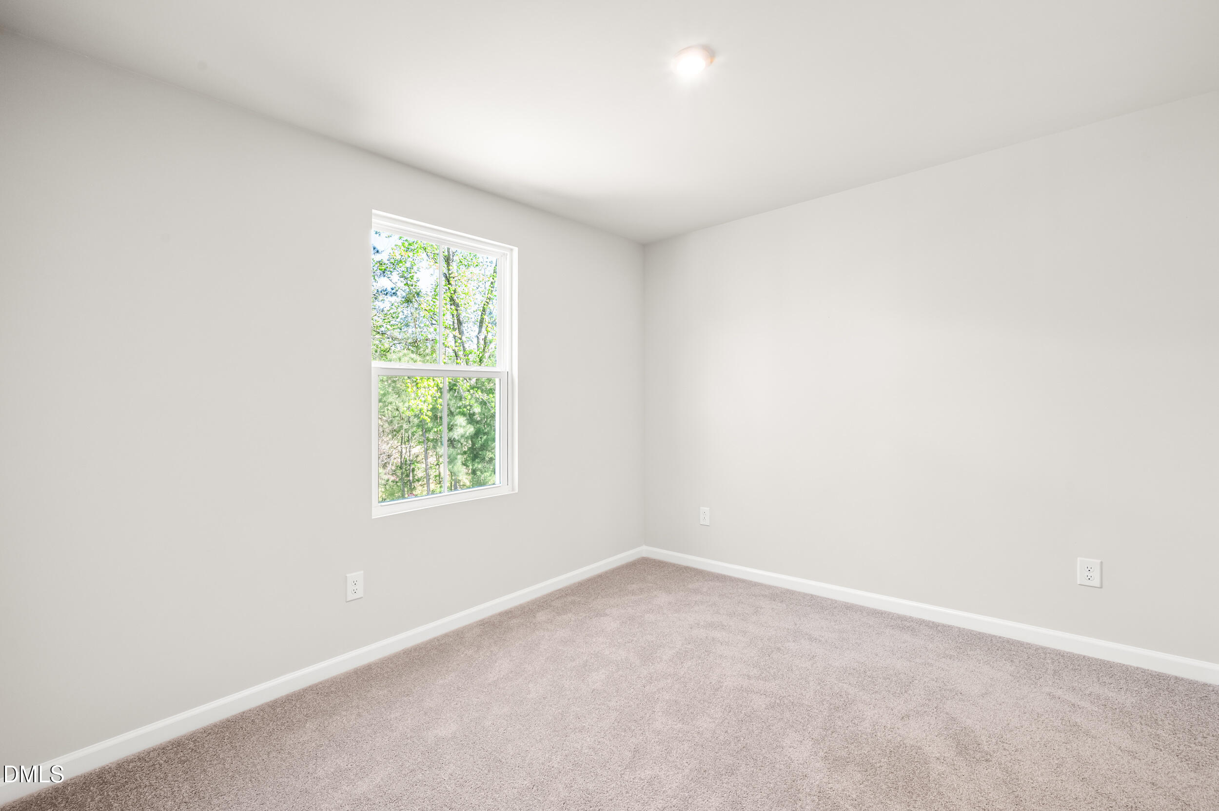 129 Cavalier Rider Run Wendell, NC 27591 - Photo 26 of 38 an empty room with a window