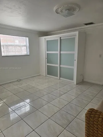 a bathroom with a sink a toilet and a shower