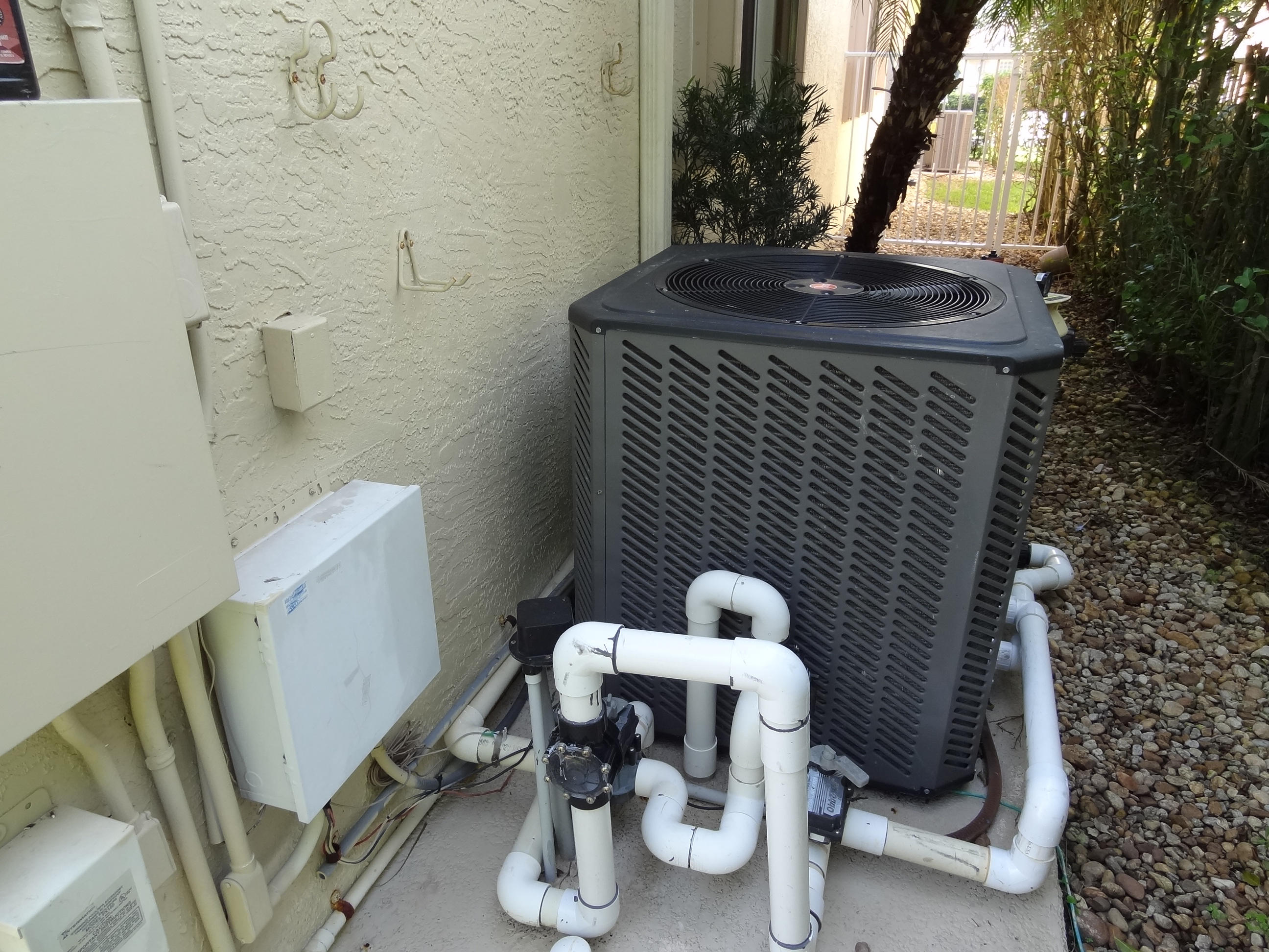 21404 Shannon Ridge Way Boca Raton, FL 33428 - Photo 40 of 42 NEW POOL HEATER AND SURGE PROTECTOR