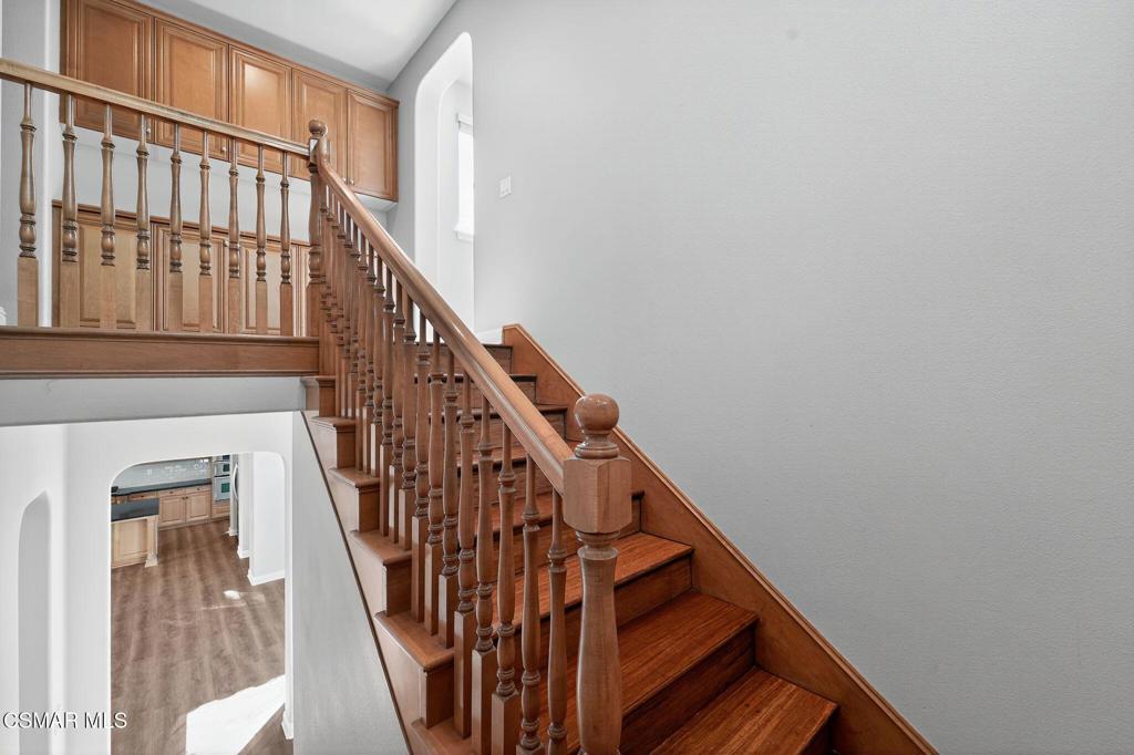 2948 Milestone Avenue Simi Valley, CA 93065 - Photo 12 of 31 a view of staircase with railing and white walls