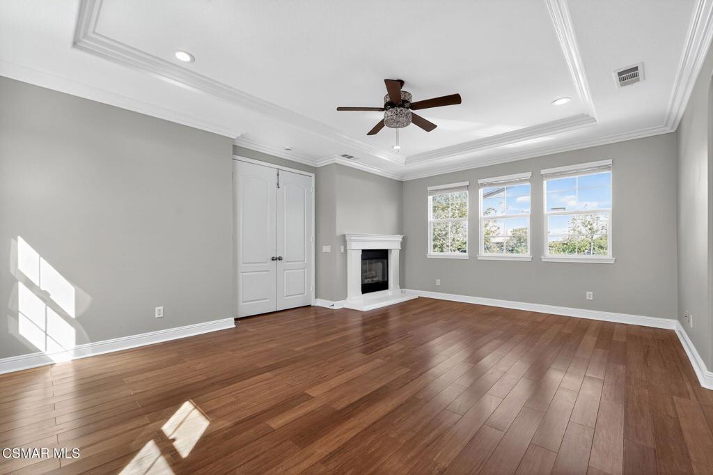 2948 Milestone Avenue Simi Valley, CA 93065 - Photo 14 of 31 a view of empty room with wooden floor and fan
