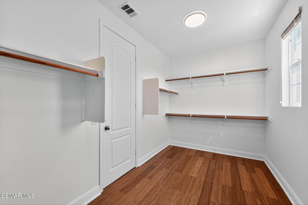 2948 Milestone Avenue Simi Valley, CA 93065 - Photo 15 of 31 a view of walk in closet with empty racks