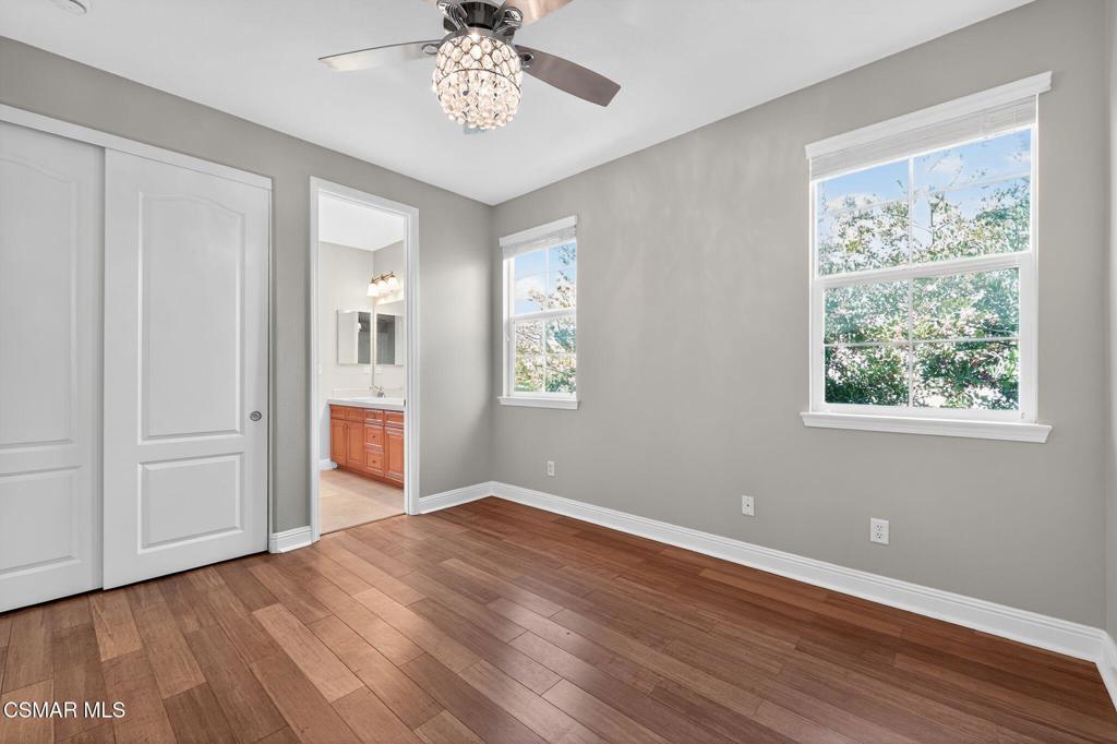 2948 Milestone Avenue Simi Valley, CA 93065 - Photo 21 of 31 a view of an empty room with a window and wooden floor