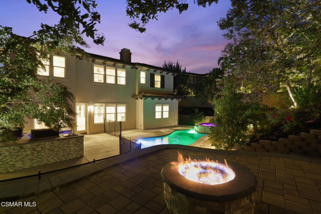 2948 Milestone Avenue Simi Valley, CA 93065 - Photo 26 of 31 a view of a patio with couches table and chairs and potted plants