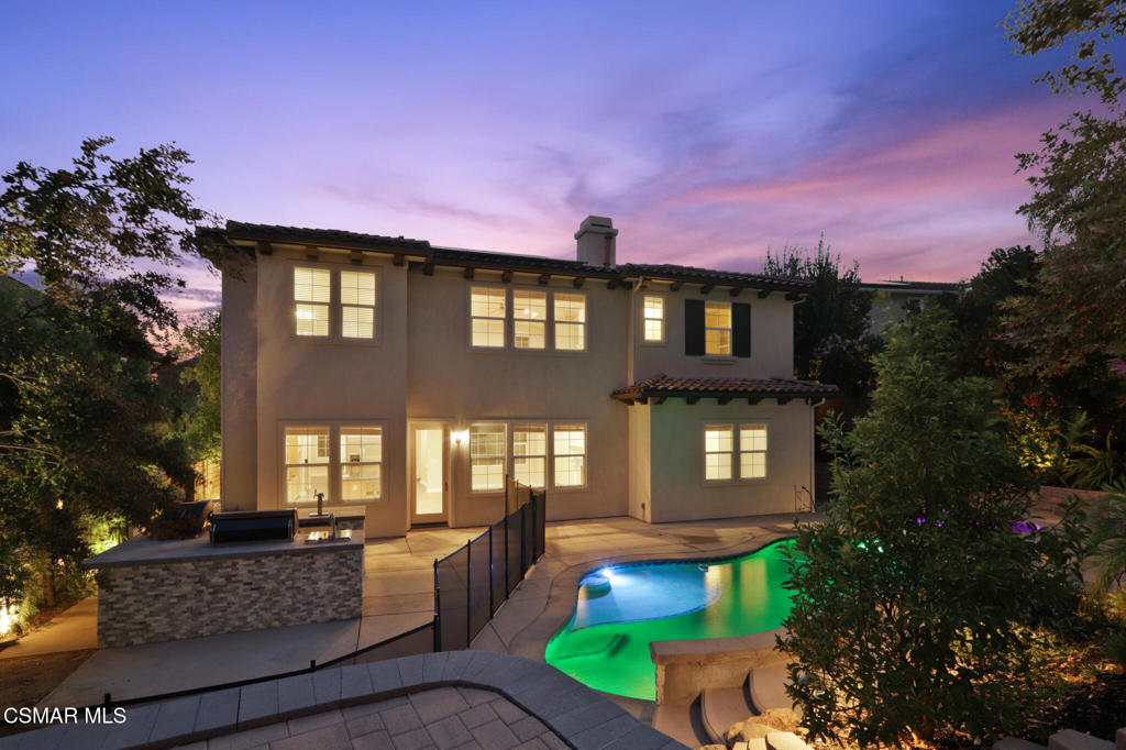 2948 Milestone Avenue Simi Valley, CA 93065 - Photo 28 of 31 a front view of a house with a yard