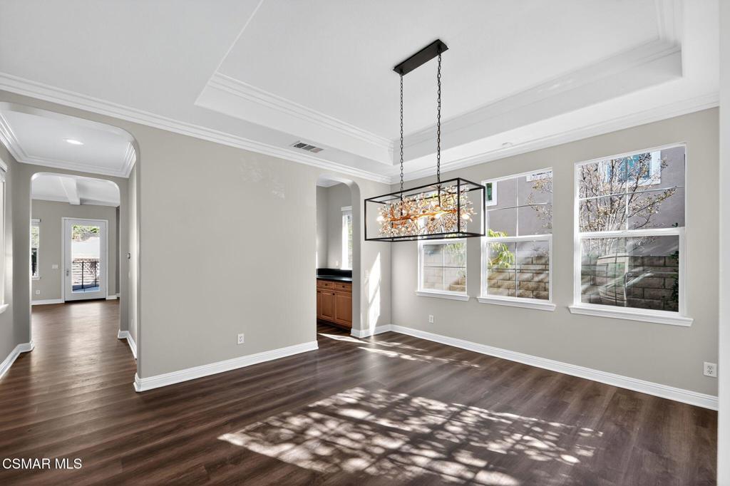 2948 Milestone Avenue Simi Valley, CA 93065 - Photo 3 of 31 a view of an empty room with wooden floor and a window