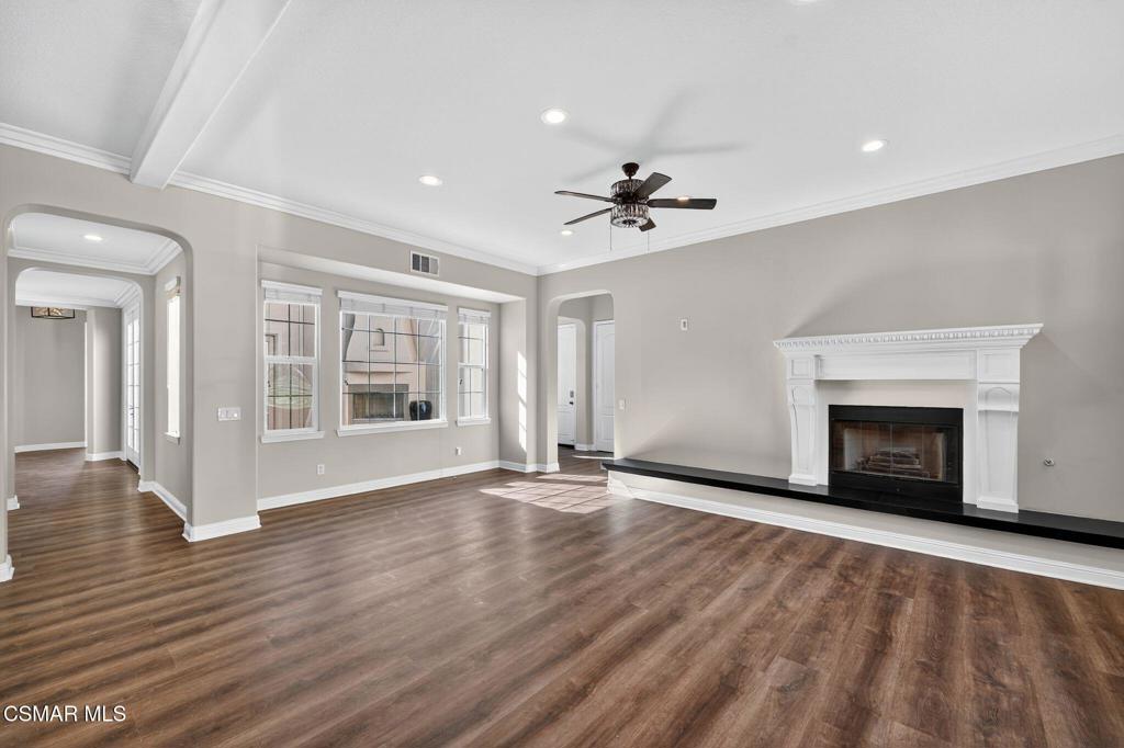 2948 Milestone Avenue Simi Valley, CA 93065 - Photo 5 of 31 a view of an empty room with a fireplace and a window