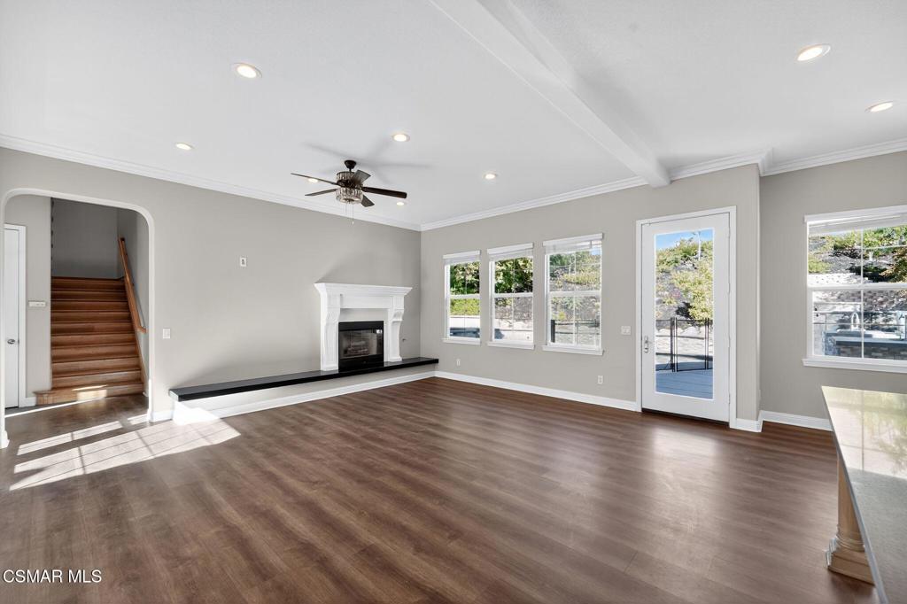 2948 Milestone Avenue Simi Valley, CA 93065 - Photo 6 of 31 a view of an empty room with a window and wooden floor