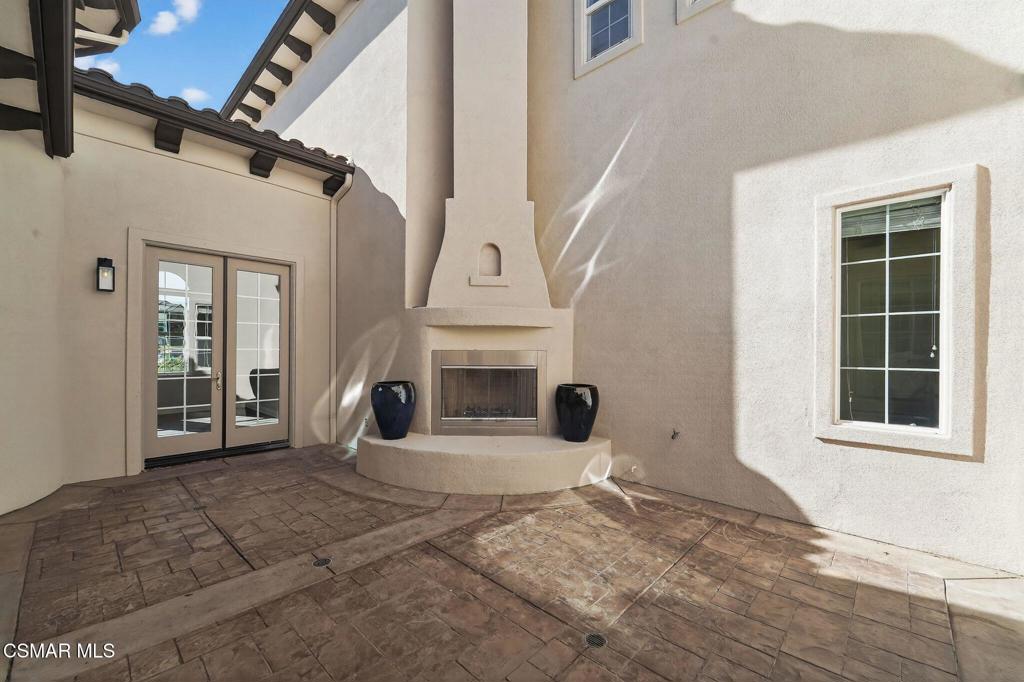 2948 Milestone Avenue Simi Valley, CA 93065 - Photo 7 of 31 a view of a livingroom with a fireplace and window
