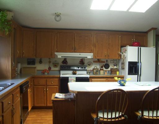 114 Rydle Road Mount Pleasant, PA 15666 - Photo 6 of 18 Kitchen. CENTER ISLAND AND 2 STOOLS