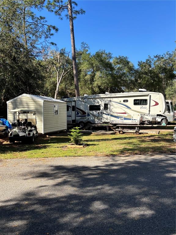 a swimming pool view with a lake view