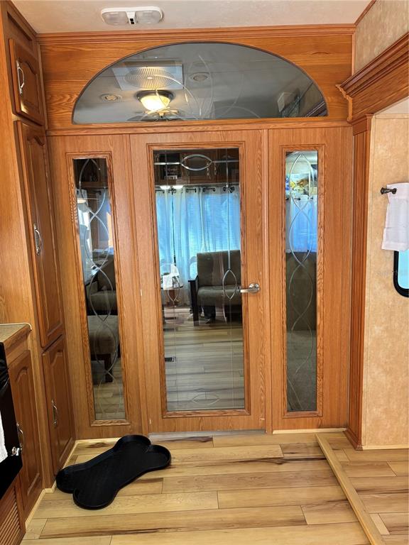 14348 Northeast 252nd Ct Road Fort McCoy, FL 32134 - Photo 12 of 51 a view of a entryway door front of house