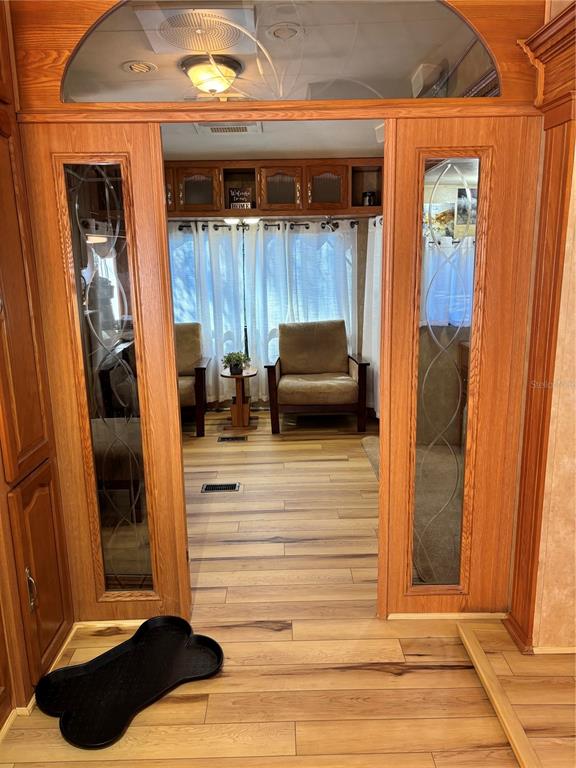 14348 Northeast 252nd Ct Road Fort McCoy, FL 32134 - Photo 13 of 51 a view of entryway and bedroom