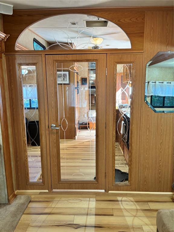 14348 Northeast 252nd Ct Road Fort McCoy, FL 32134 - Photo 18 of 51 a view of a entryway door front of house