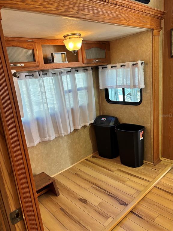 14348 Northeast 252nd Ct Road Fort McCoy, FL 32134 - Photo 20 of 51 a view of balcony with wooden floor