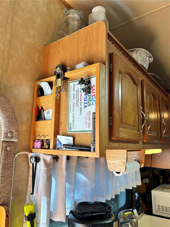 14348 Northeast 252nd Ct Road Fort McCoy, FL 32134 - Photo 27 of 51 a bathroom with a sink and a mirror