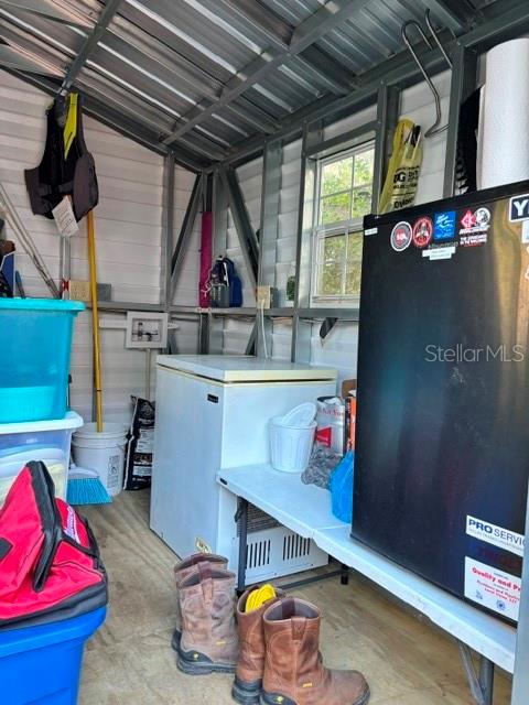 14348 Northeast 252nd Ct Road Fort McCoy, FL 32134 - Photo 43 of 51 a room with storage and utility