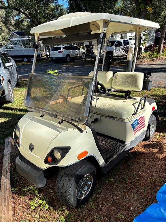 14348 Northeast 252nd Ct Road Fort McCoy, FL 32134 - Photo 47 of 51 a car parked in front of it
