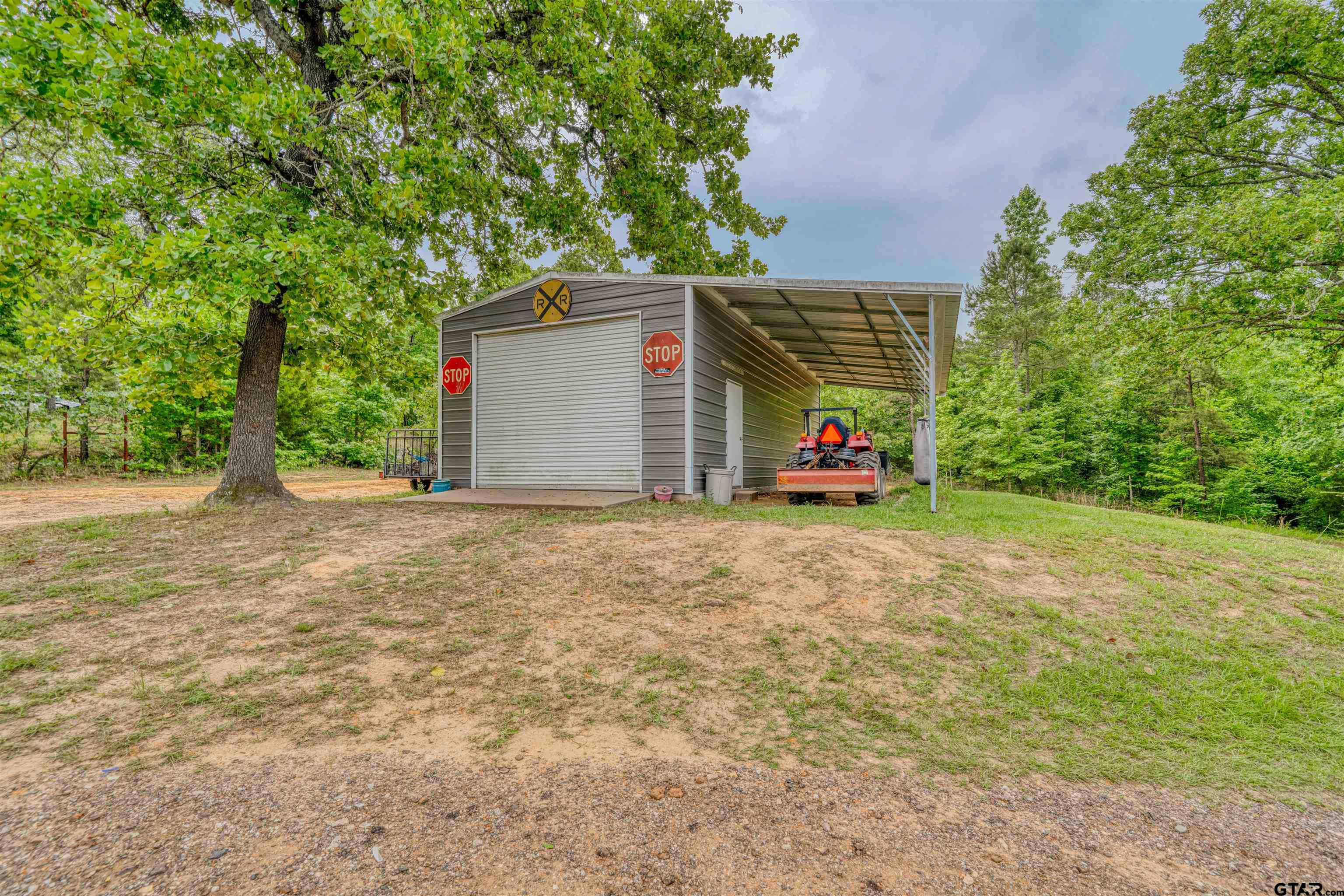 1776 Mustang Road Gilmer, TX 75645 - Photo 10 of 45 a view of outdoor space and yard