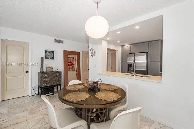 a view of a livingroom with furniture and window