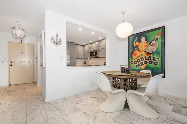 a view of a dining room with furniture