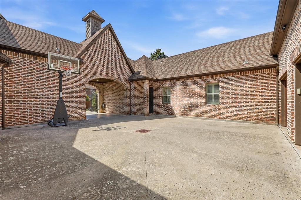 476 Hidden Valley Lane Coppell, TX 75019 - Photo 35 of 40 a front view of a house with a yard and garage